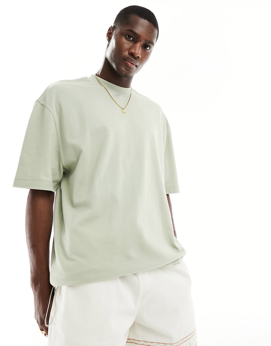 ASOS DESIGN oversized t-shirt with drawcord hem in light green