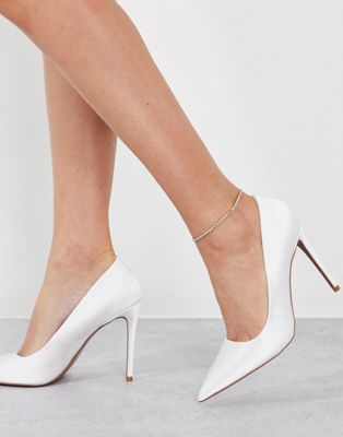Penza pointed high heeled court shoes in white