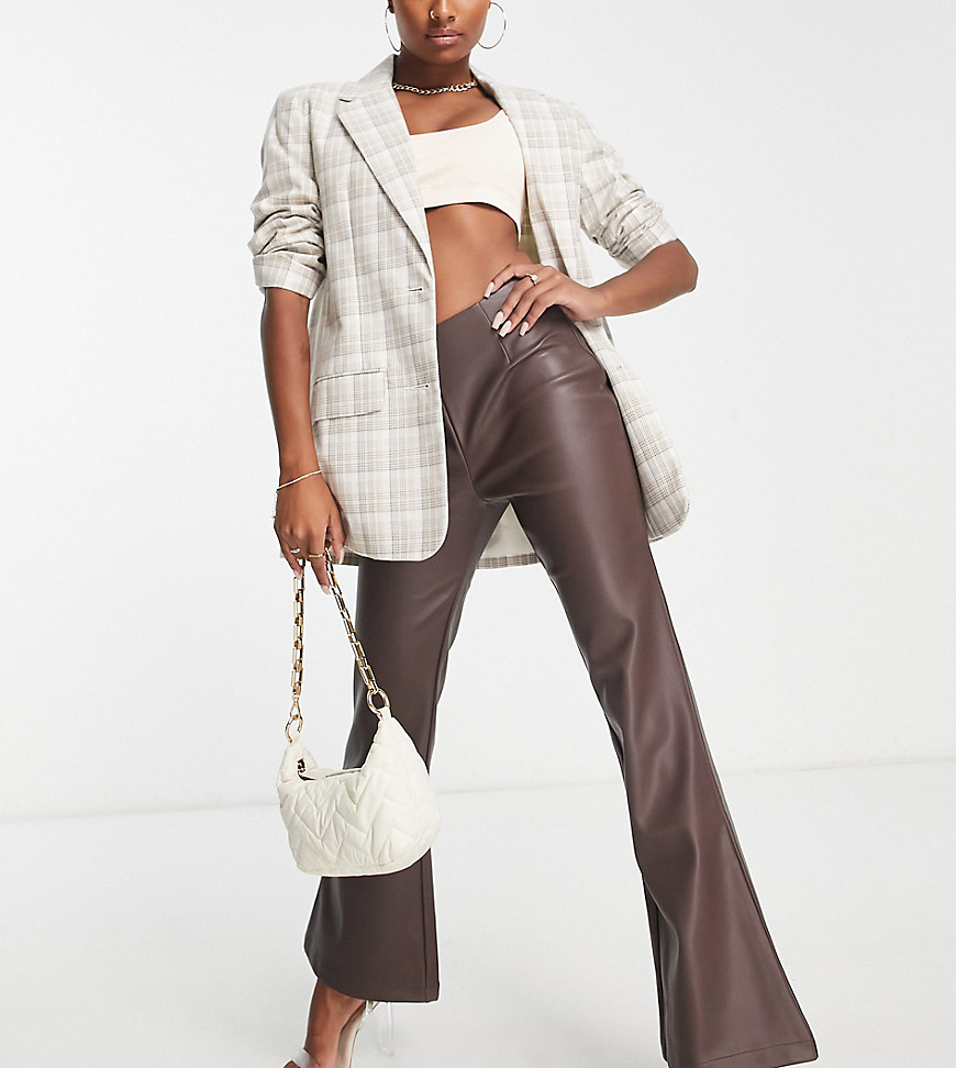 ASOS DESIGN Petite stretch faux leather flare trouser in chocolate-Brown