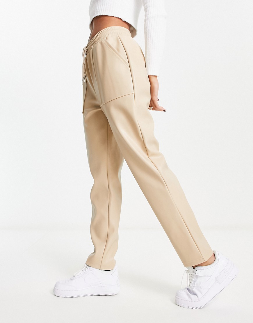 ASOS DESIGN pull on faux leather jogger in mushroom-Brown