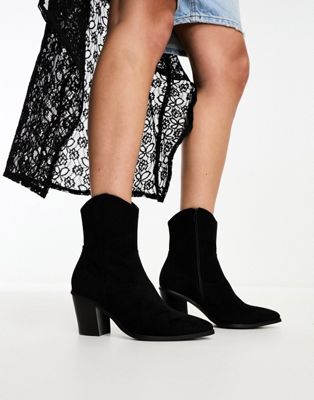 Rational heeled western boots in black