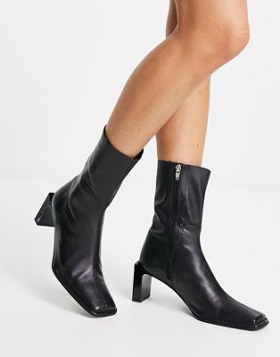 Roman premium leather heeled sock boots in black