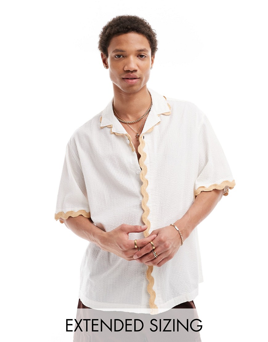 ASOS DESIGN short sleeve relaxed revere collar seersucker shirt with wavy detailing in white