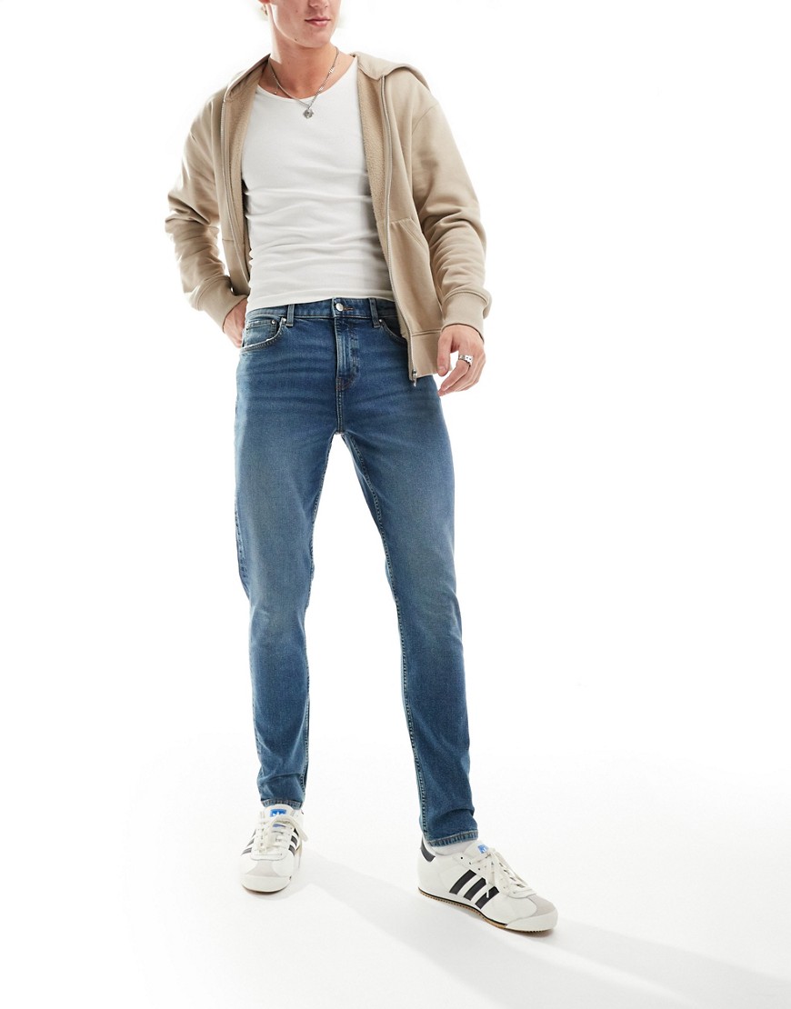 ASOS DESIGN skinny jean in vintage mid tint-Blue