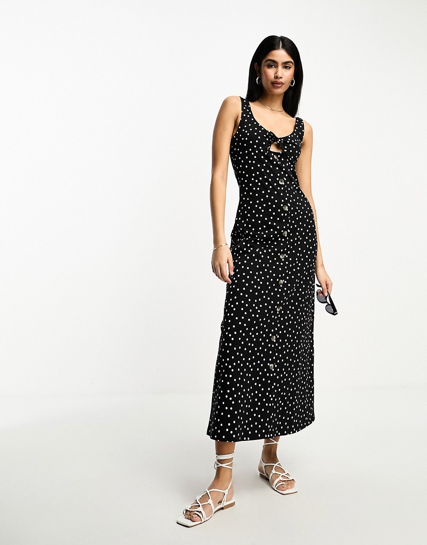 ASOS DESIGN sleeveless midi dress with buttons and tie detail in black spot