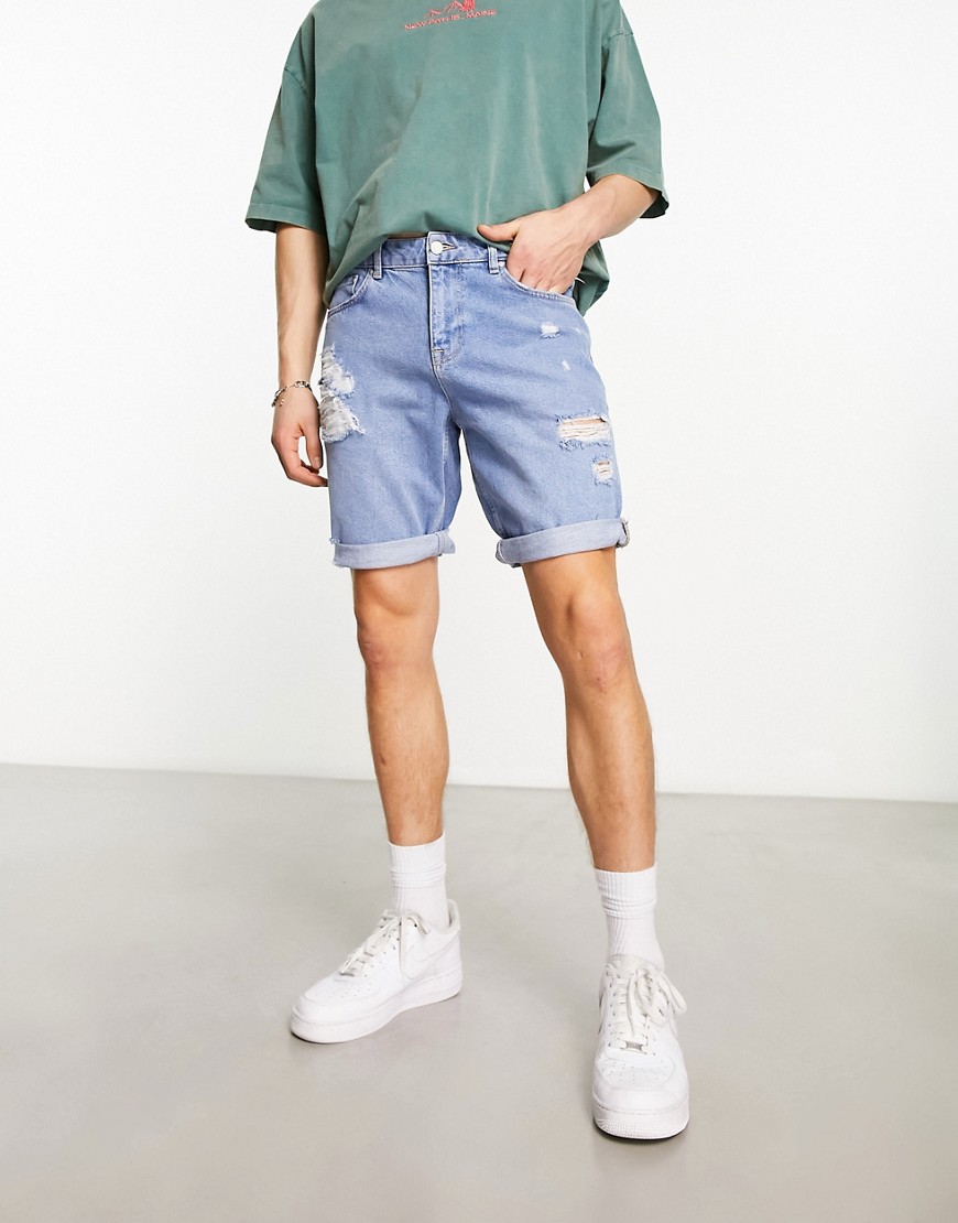 ASOS DESIGN slim mid length denim shorts in mid blue wash with rips
