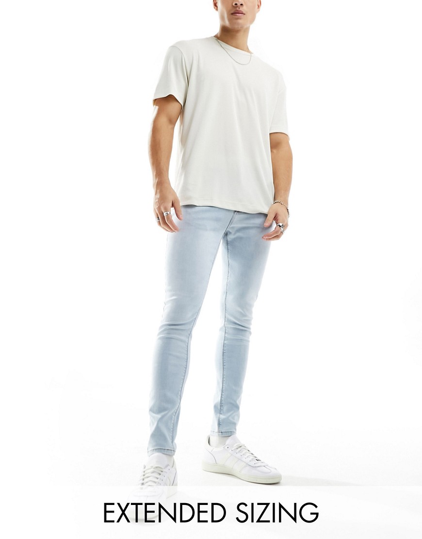 ASOS DESIGN spray on jeans with power stretch in light wash blue