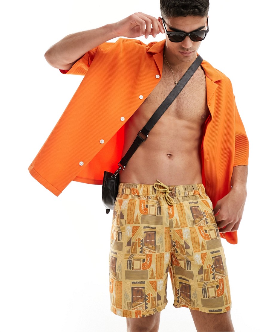 ASOS DESIGN swim shorts in mid length in vintage Aztec print-Orange
