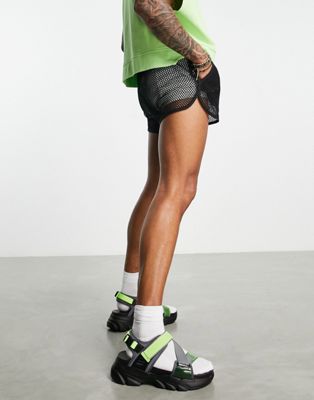 tech sandals in black and neon green on chunky sole