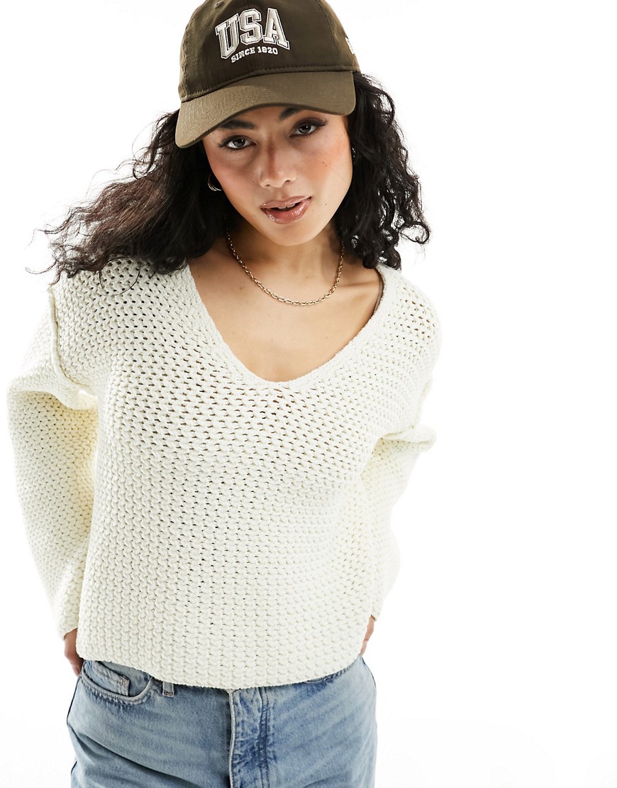 ASOS DESIGN v neck jumper in textured stitch in cream-White