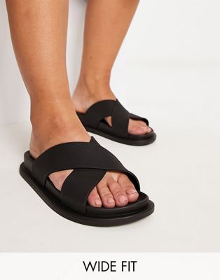 Wide Fit Fixation cross strap jelly flat sandals in black