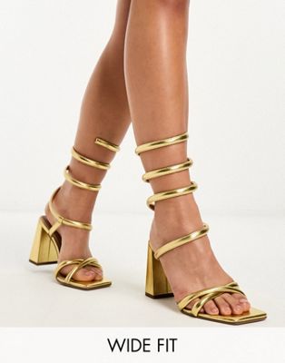 Wide Fit Wrap ankle coil high heeled sandals in gold