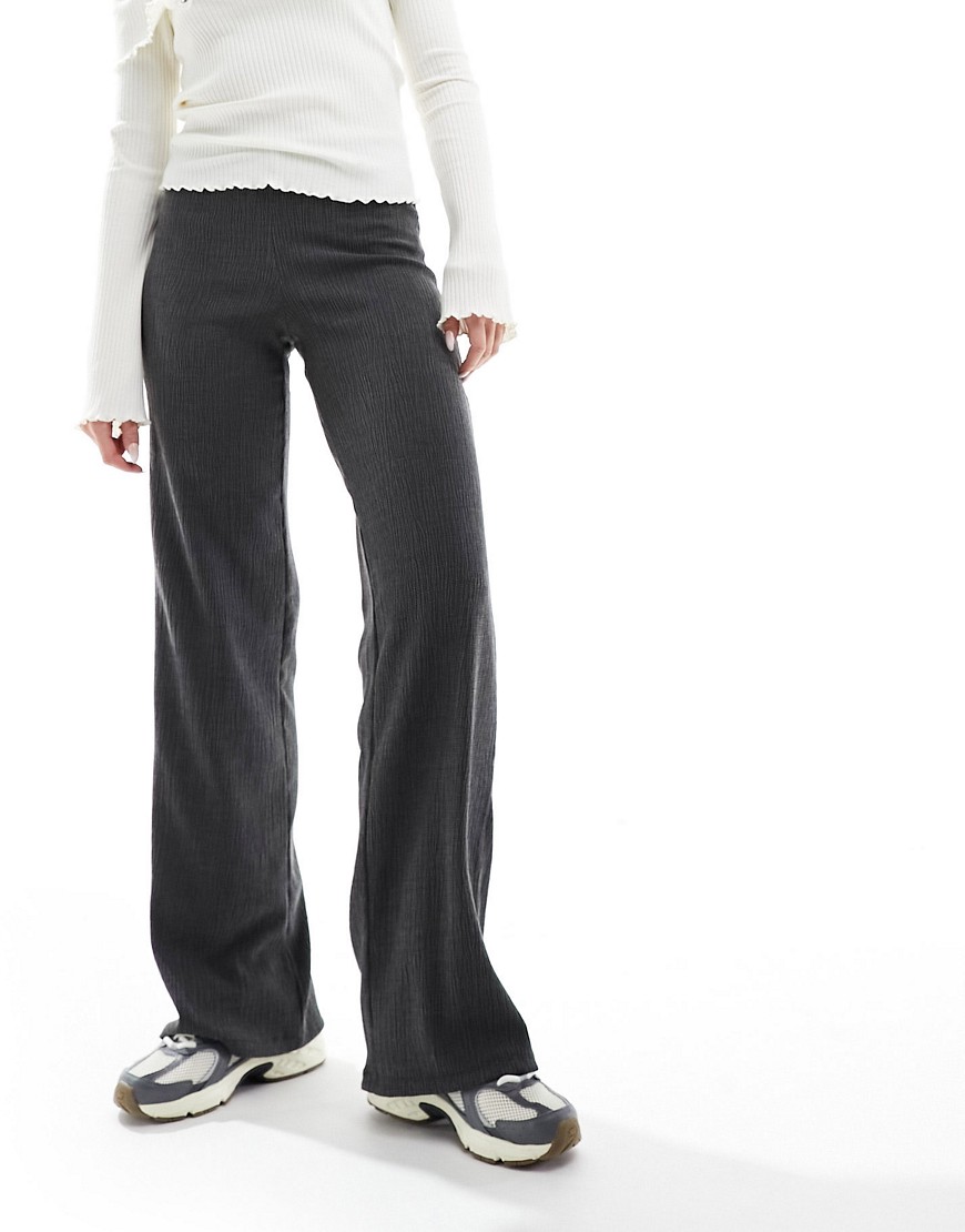 Bershka crinkle flared trousers in charcoal-White
