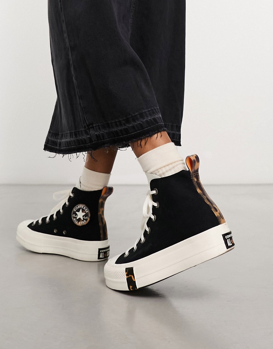 Converse Chuck Taylor All Star lift trainers in black with animal print detailing