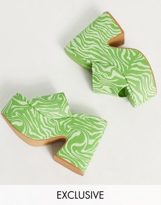 Exclusive chunky platform mule sandals in green zebra print