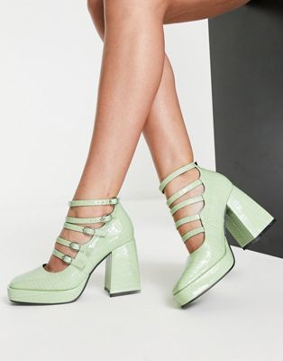 heeled shoes with strap detailing in sage green vinyl