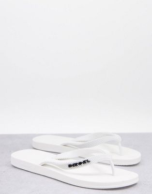Kauay flip flops in white