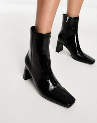 mid heel ankle boots in black patent