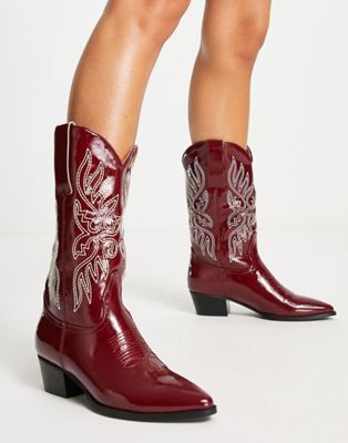 western boots in dark red