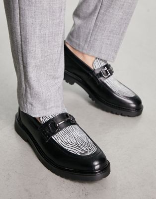 Exclusive Alevero loafers in black leather and zebra pony