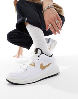 Stadium 90 trainer in white and gold