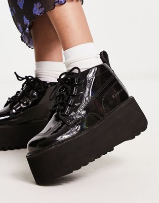 Kick platform boots in black holographic patent