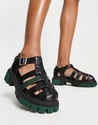 gladiator sandal in black with green sole