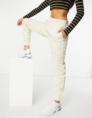 Lacoste monogram logo sweatpants in cream - Click1Get2 Sale