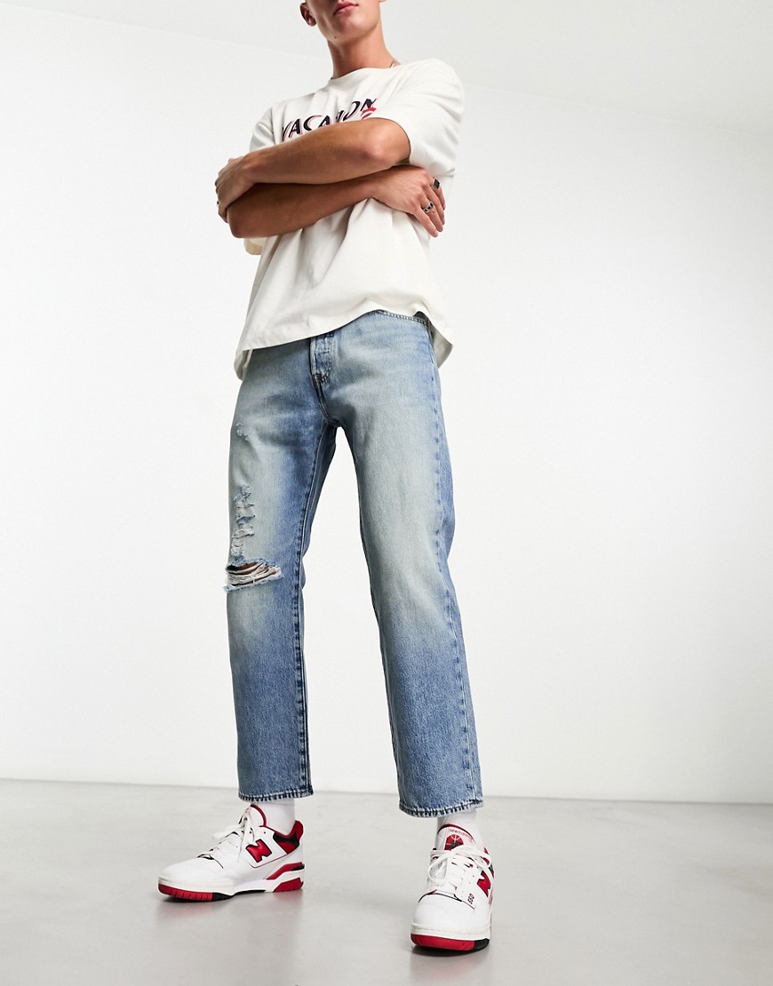 Levi’s 501 ’93 original fit crop jeans in mid blue wash with distressing