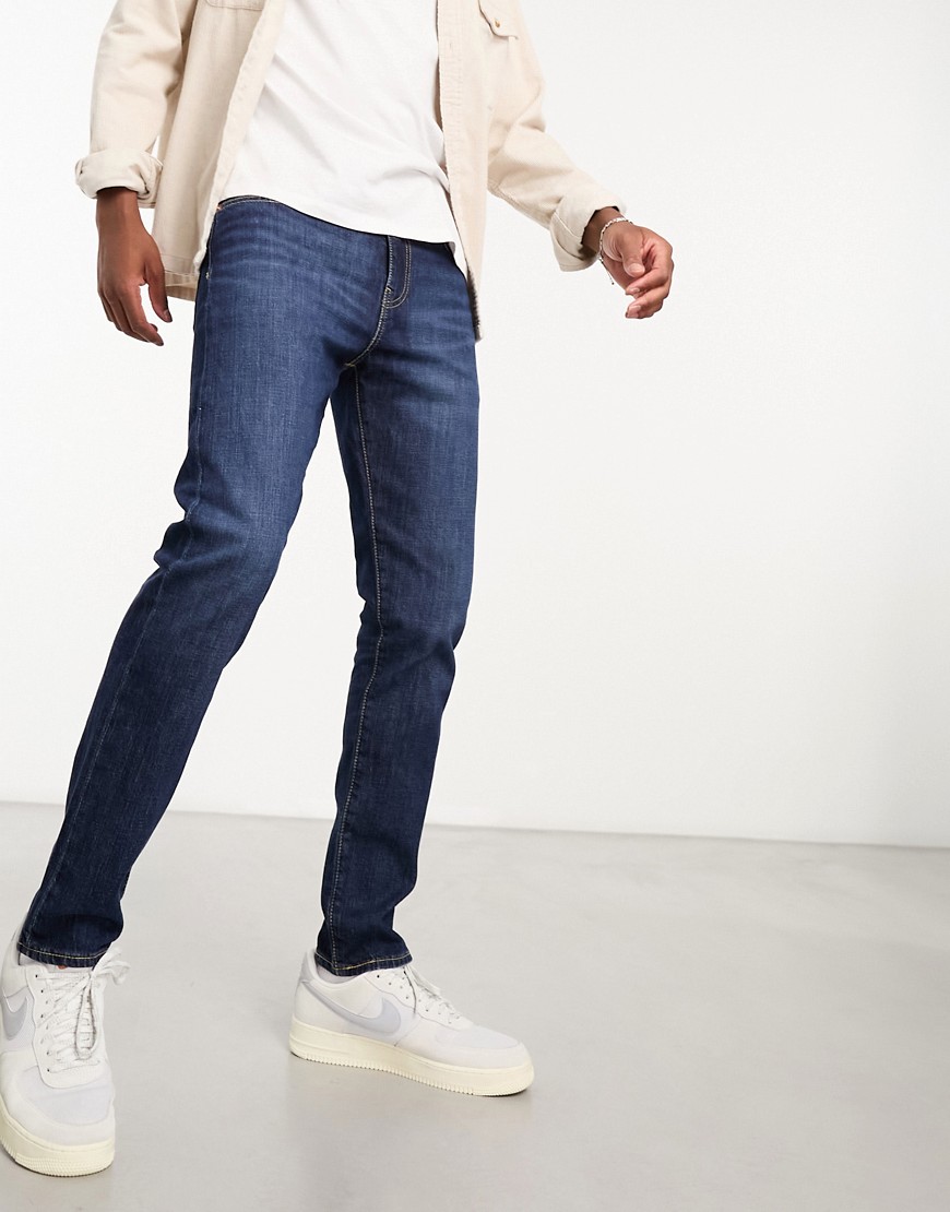 Levi’s 512 slim taper jeans in dark navy wash