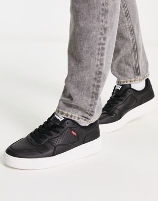 Glide leather trainer in black with chunky sole and red tab logo