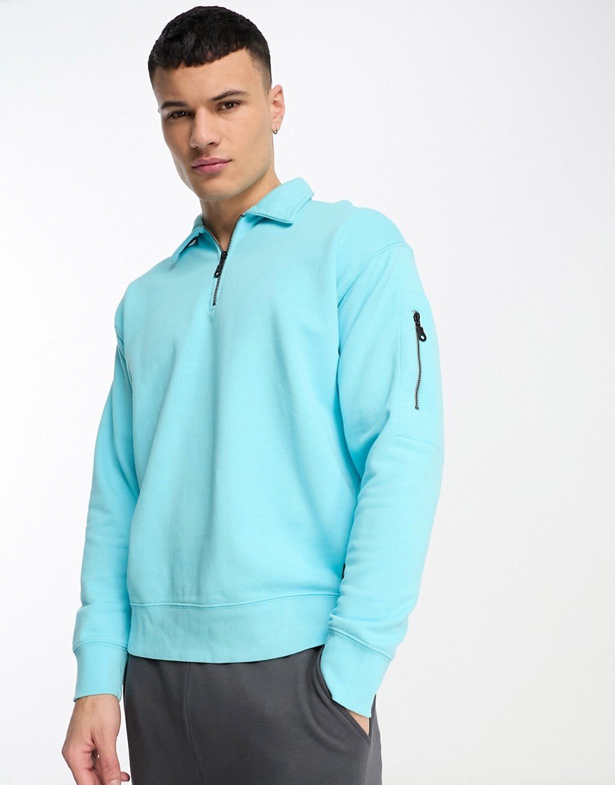 Levi’s Skate half zip sweat in light blue with small logo