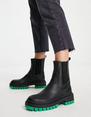 chelsea boots in black with green sole