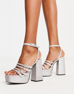 mega platform strappy heeled sandals in silver glitter