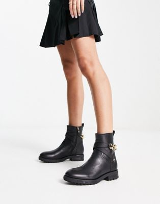 chain detail boots in black