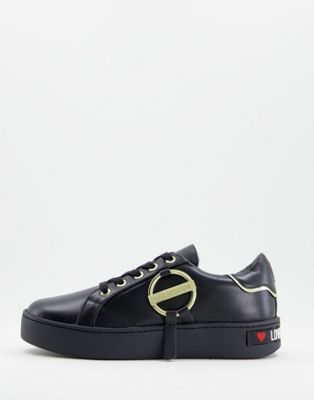 gold hardware trainers in black