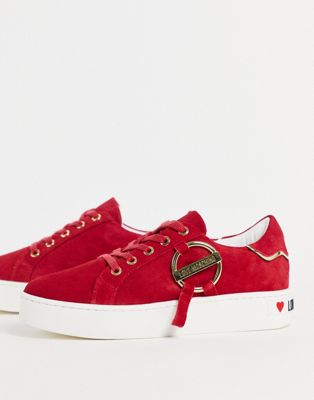 gold hardware trainers in red