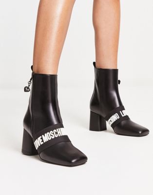 logo detail heeled boots in black