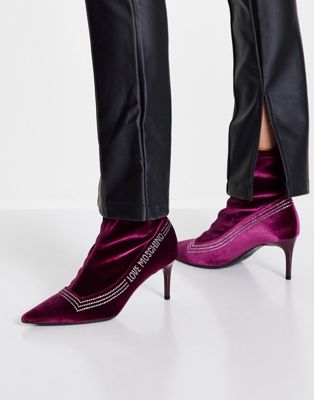 pointed heeled logo sock boots in burgundy velvet
