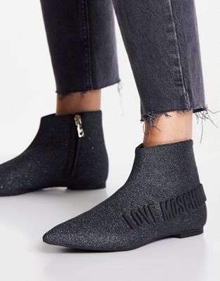 pointed low ankle boots in black glitter