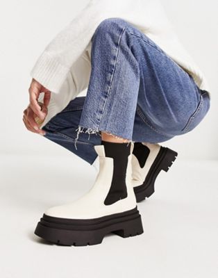 pull on boots in cream and black colourblock
