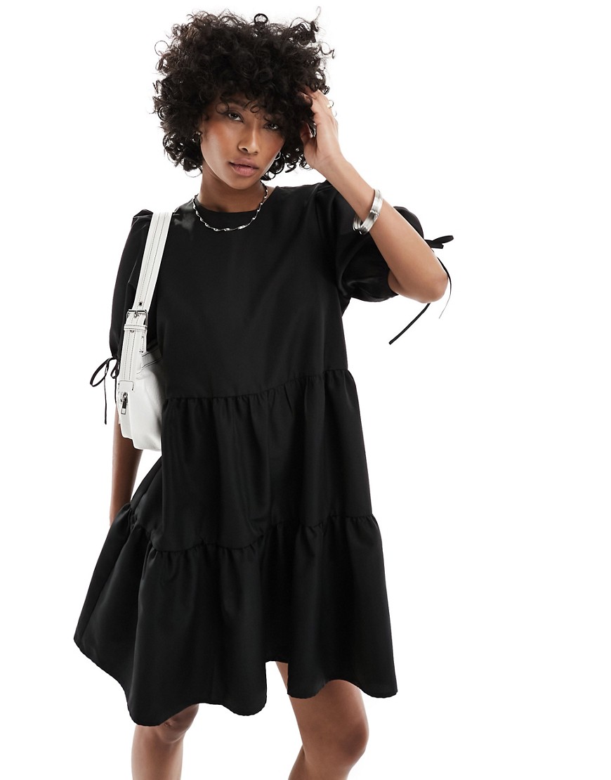 Monki short sleeve mini tiered dress with bow detail in black
