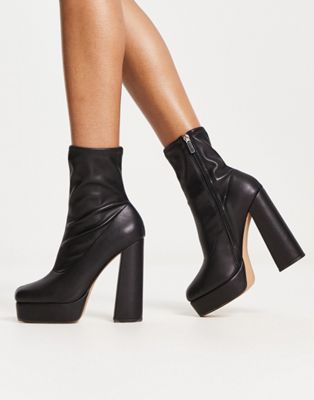 platform high heeled boots in black
