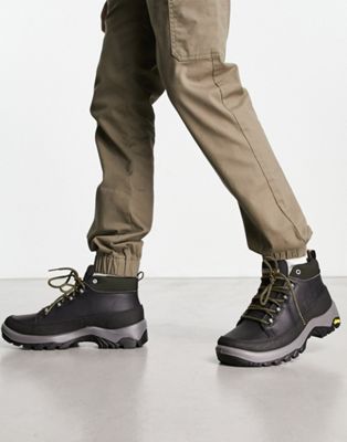 phlo boots in black with vibram sole