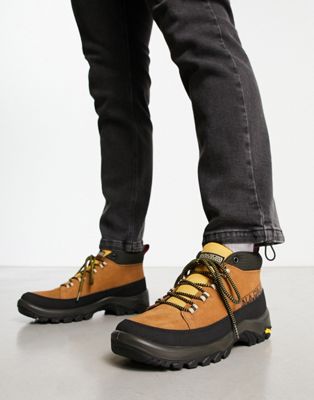 phlo boots in orange with vibram sole