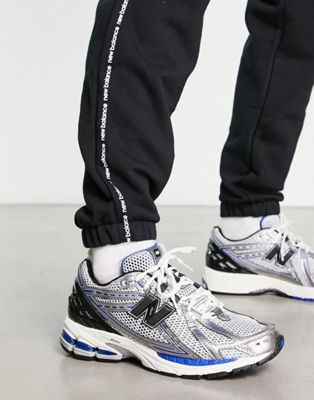1906 trainers in white metallic and blue with black