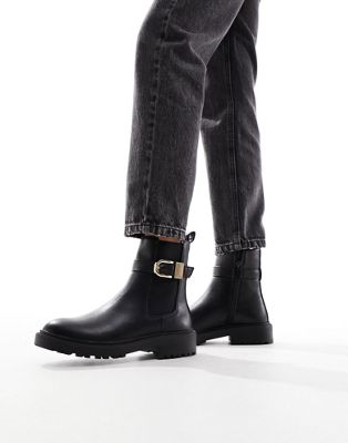 chelsea boot with hardware detail in black