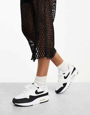 Nike Air Max 1 trainers in white and black