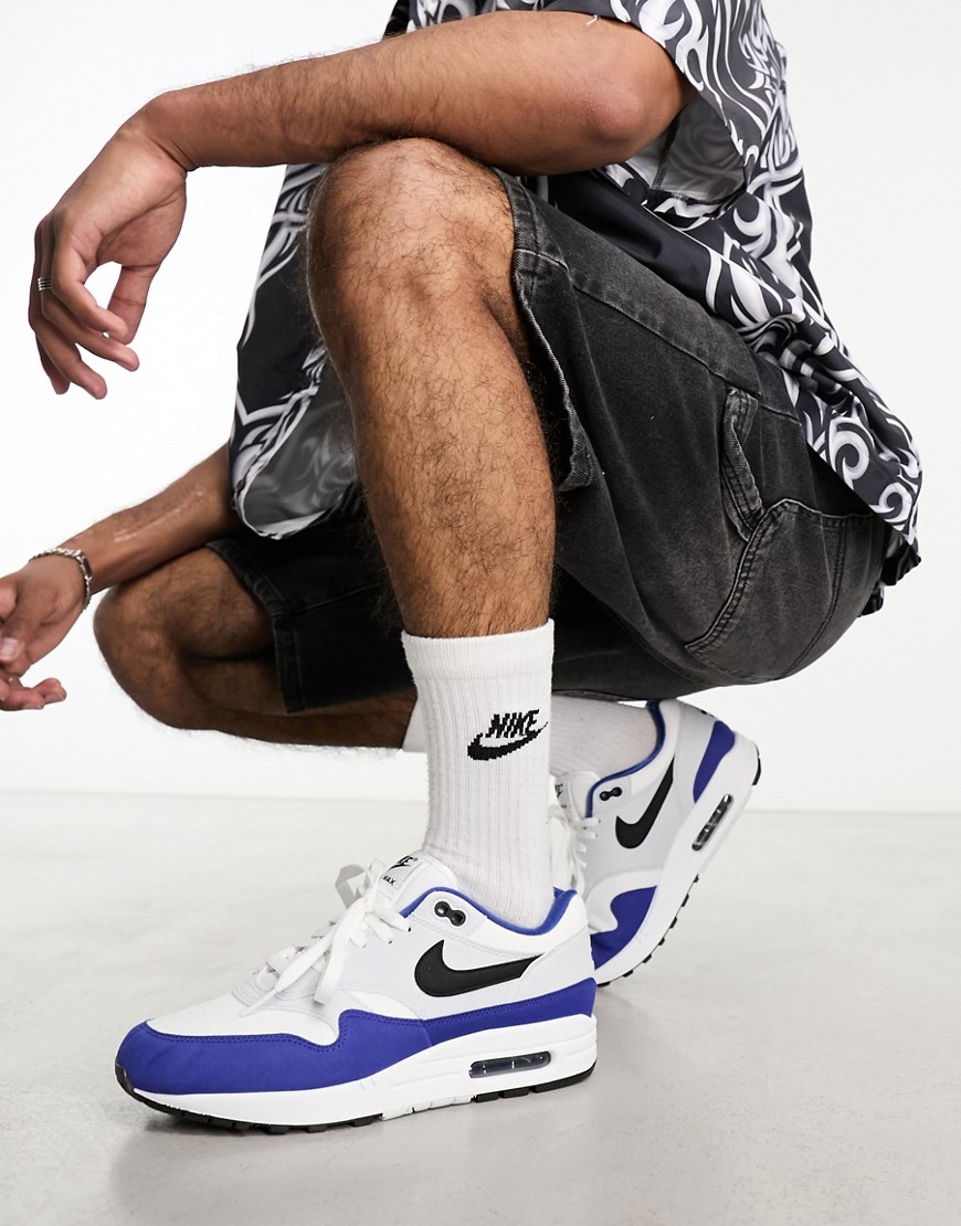 Nike Air Max 1 trainers in white, black and blue