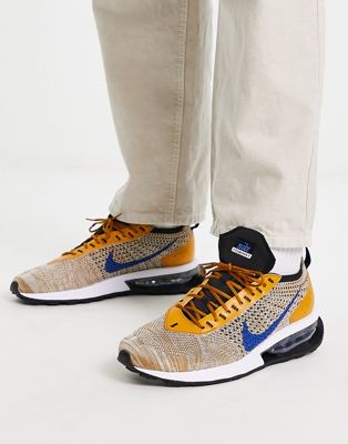 Air Max Flyknit Racer trainers in gold and hyper royal
